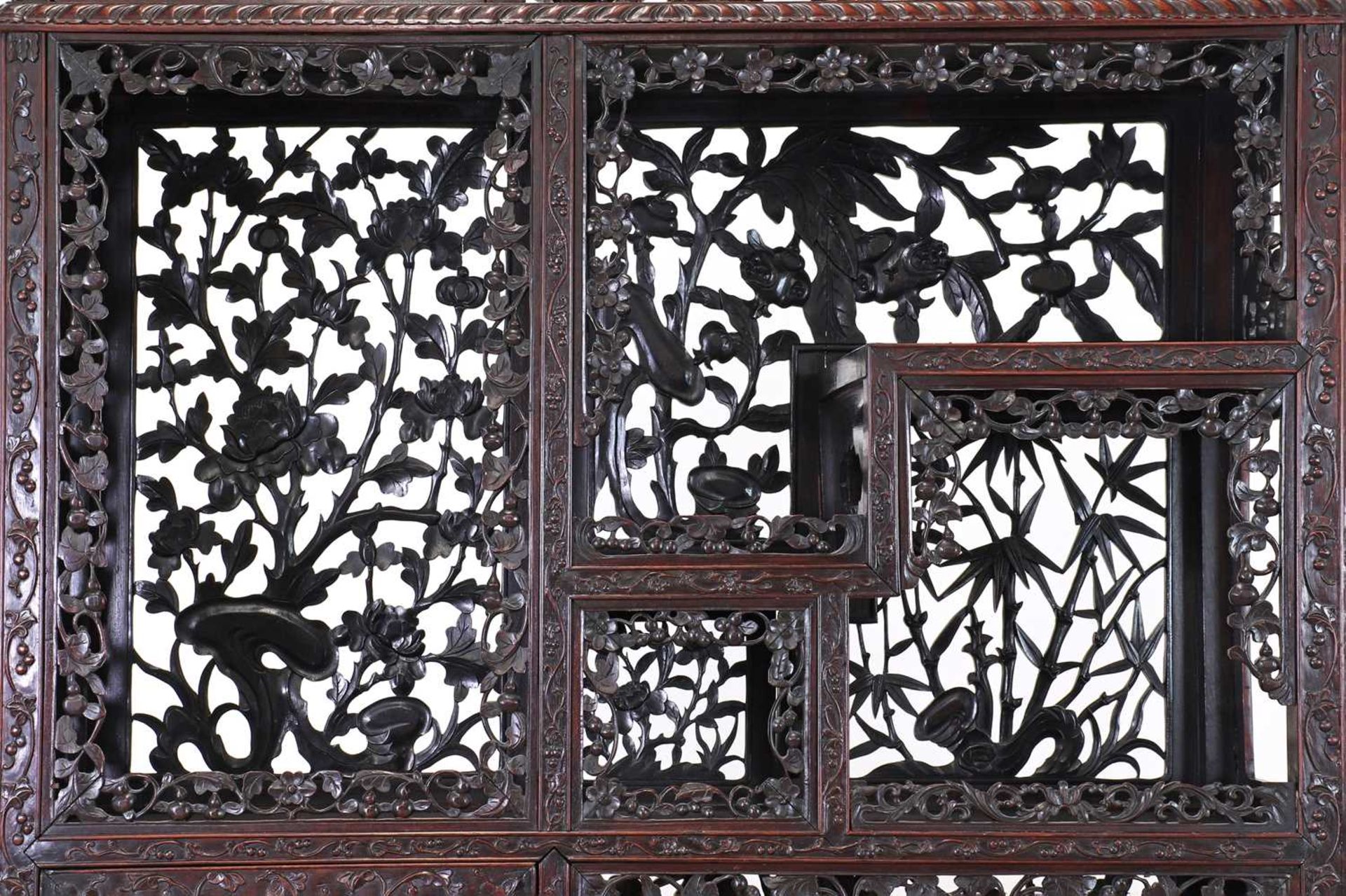 A carved and pierced hardwood cabinet, - Image 13 of 33