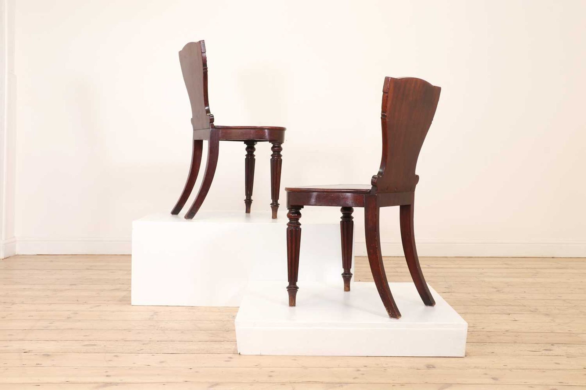 A pair of George IV mahogany hall chairs, - Image 3 of 7