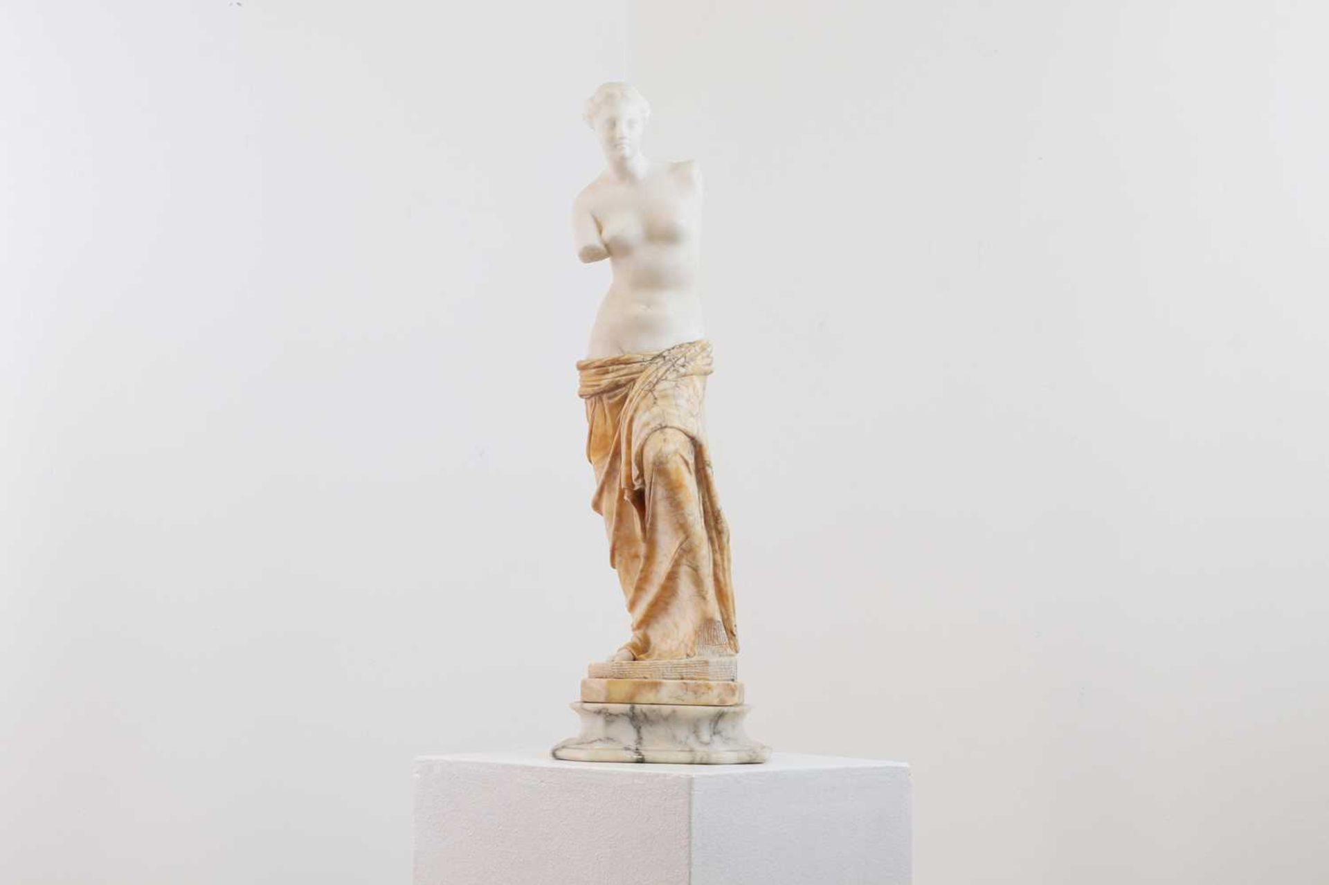 A marble figure of the Venus de Milo,