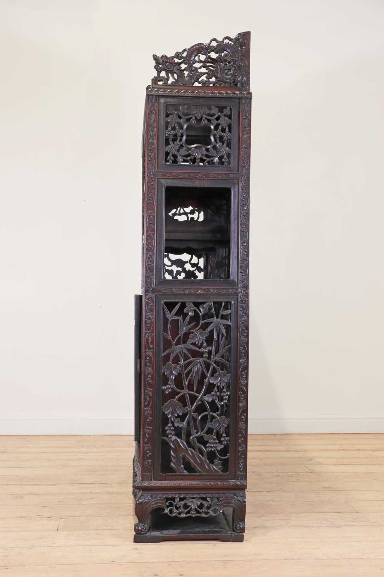 A carved and pierced hardwood cabinet, - Image 9 of 33