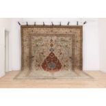 A Persian wool carpet,