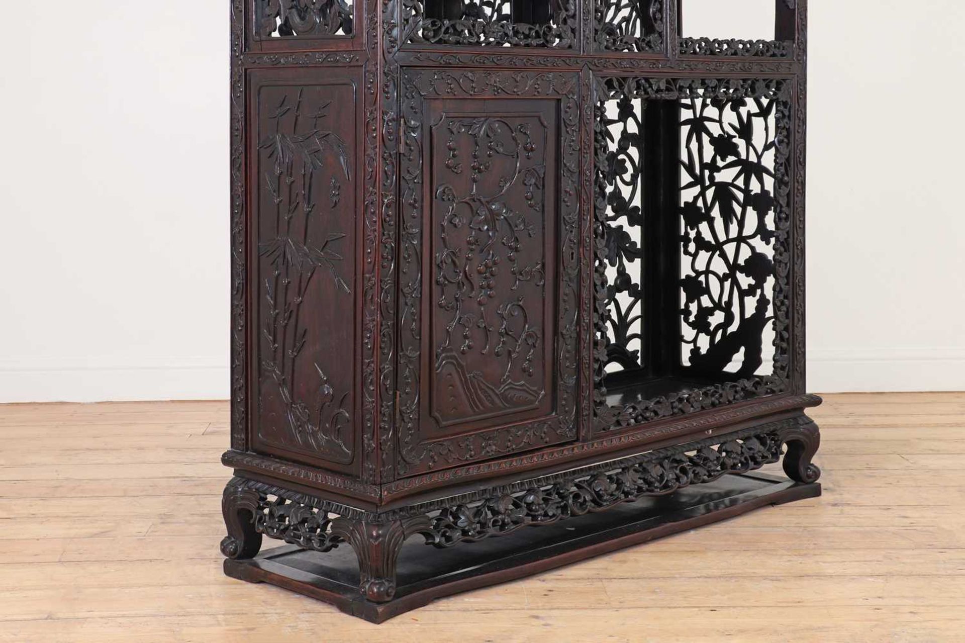 A carved and pierced hardwood cabinet, - Image 6 of 33