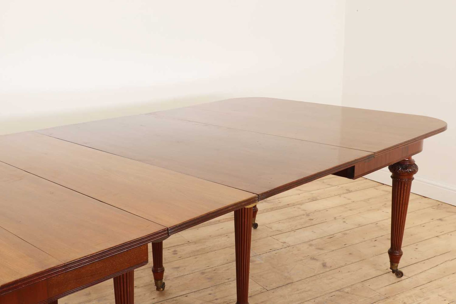 A mahogany extending dining table in the manner of Gillows, - Image 8 of 8