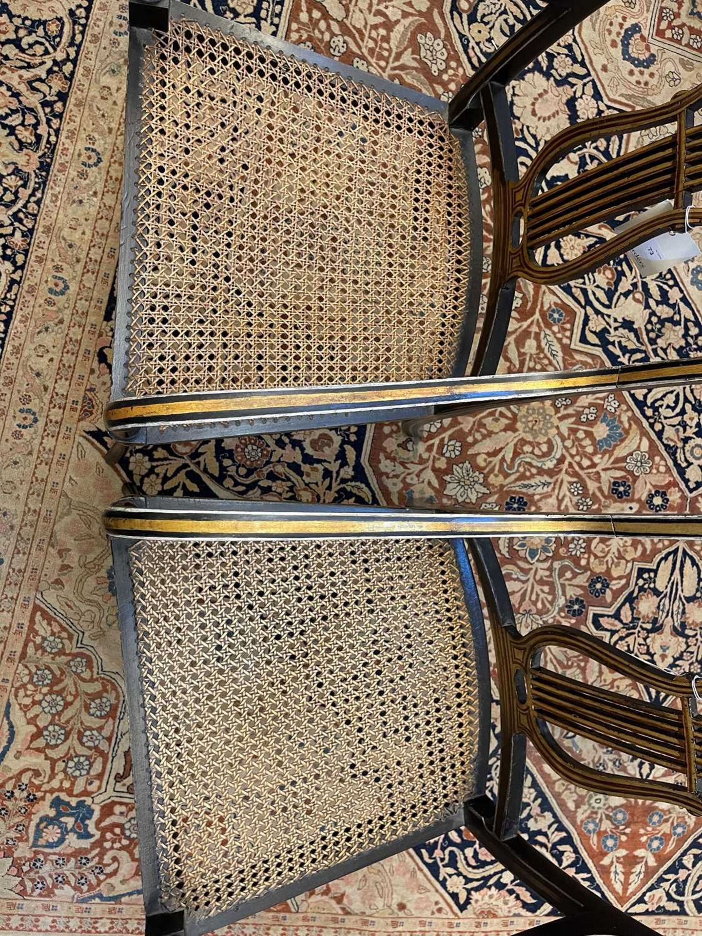 A pair of Regency ebonised and parcel-gilt armchairs, - Image 12 of 47