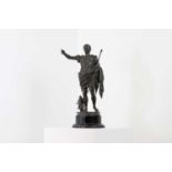 A grand tour-style bronze figure,