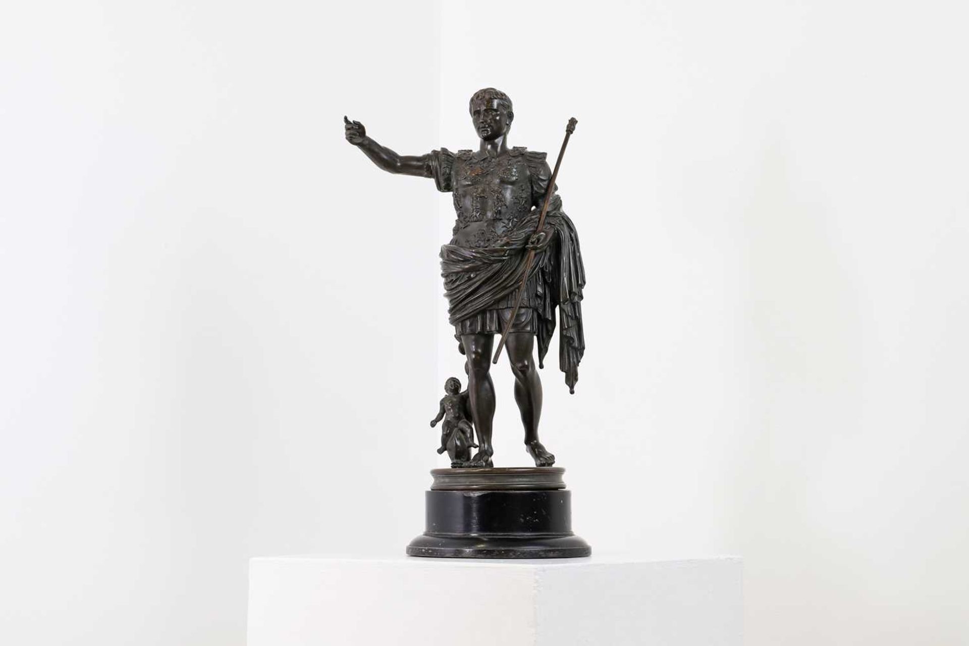 A grand tour-style bronze figure,