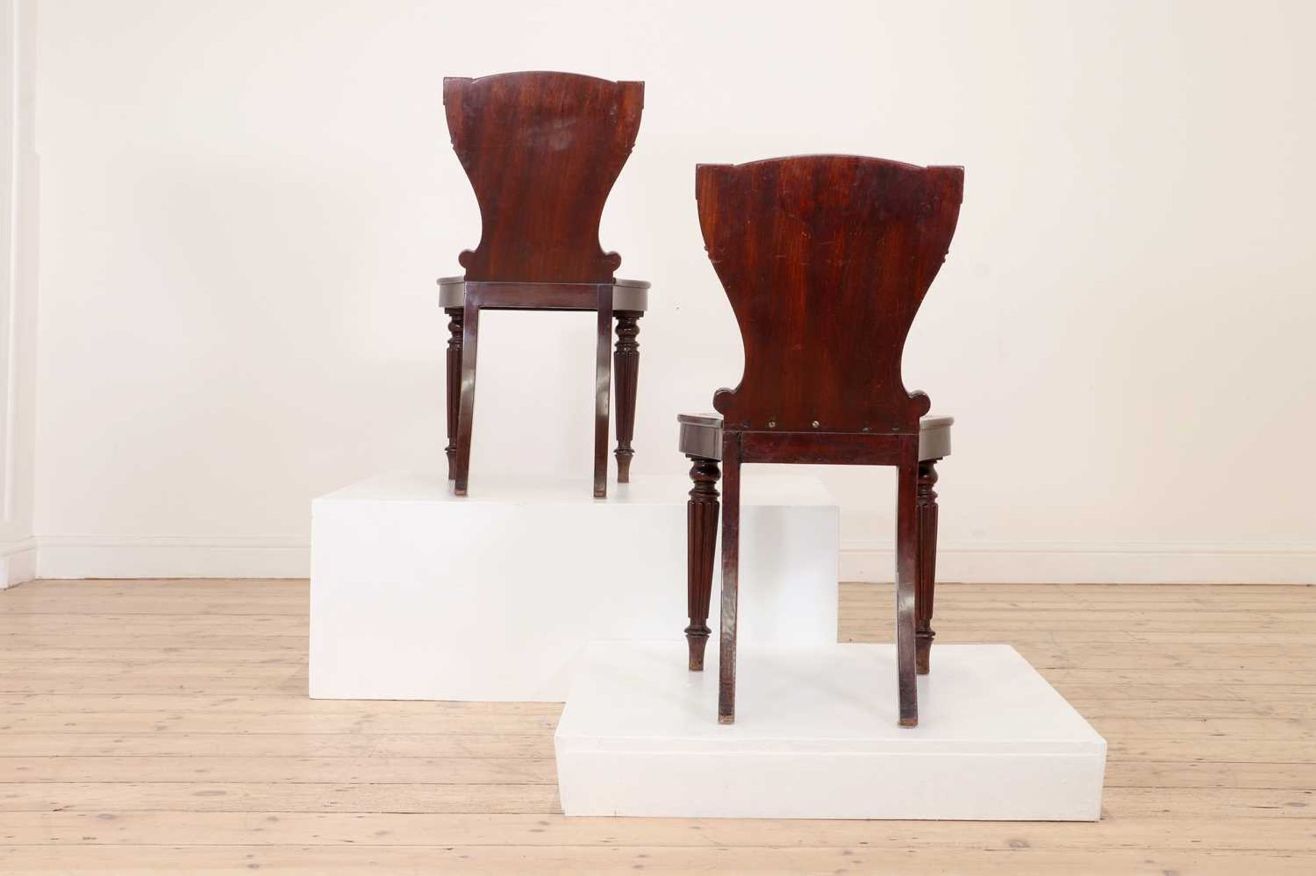 A pair of George IV mahogany hall chairs, - Image 4 of 7