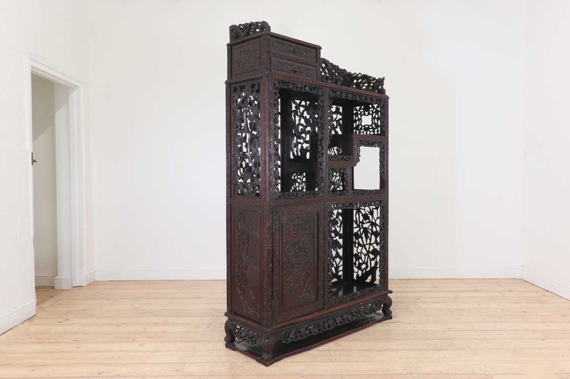 A carved and pierced hardwood cabinet, - Image 3 of 33