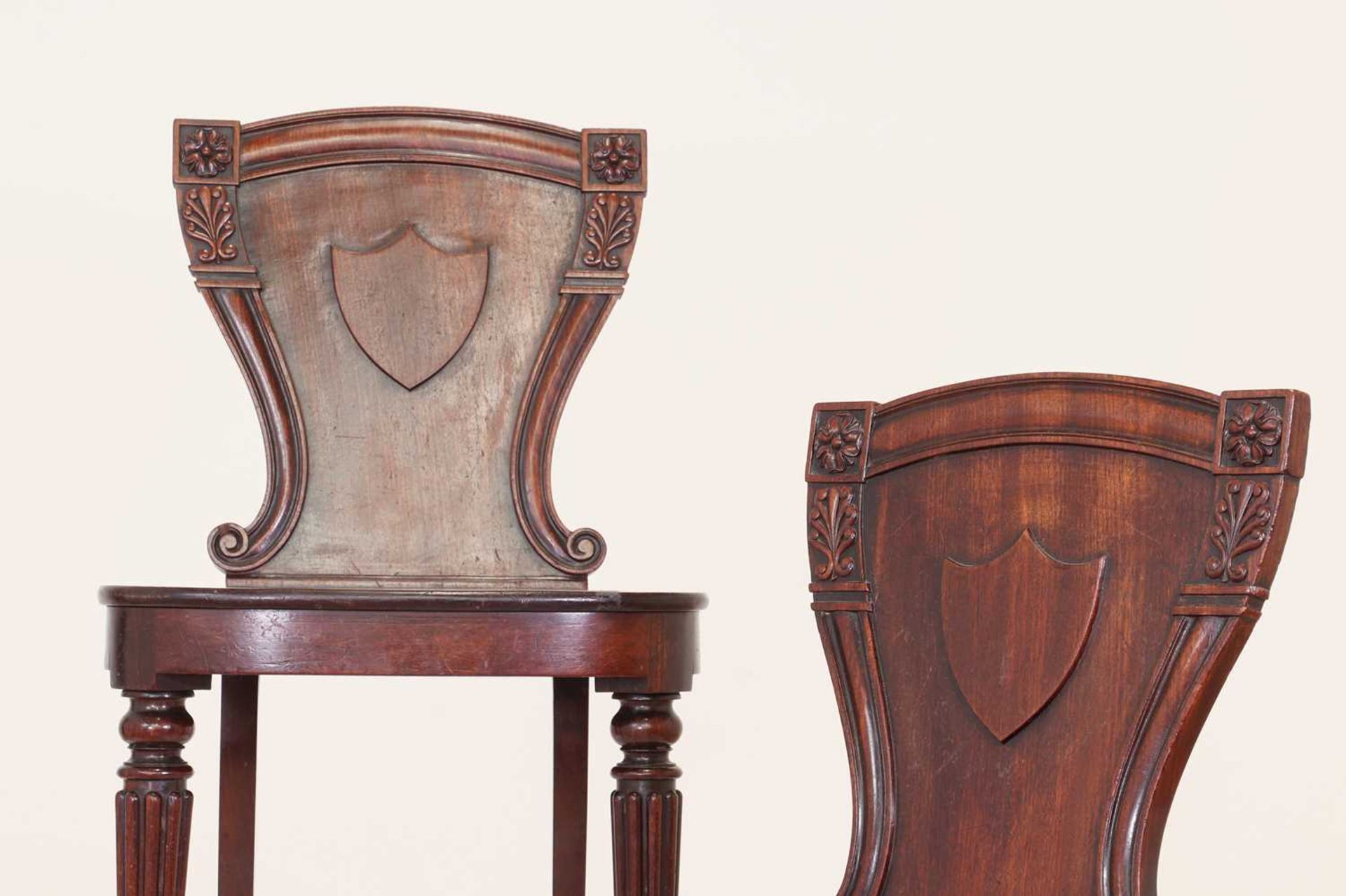 A pair of George IV mahogany hall chairs, - Image 6 of 7