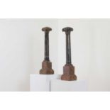 A pair of marble candlesticks,