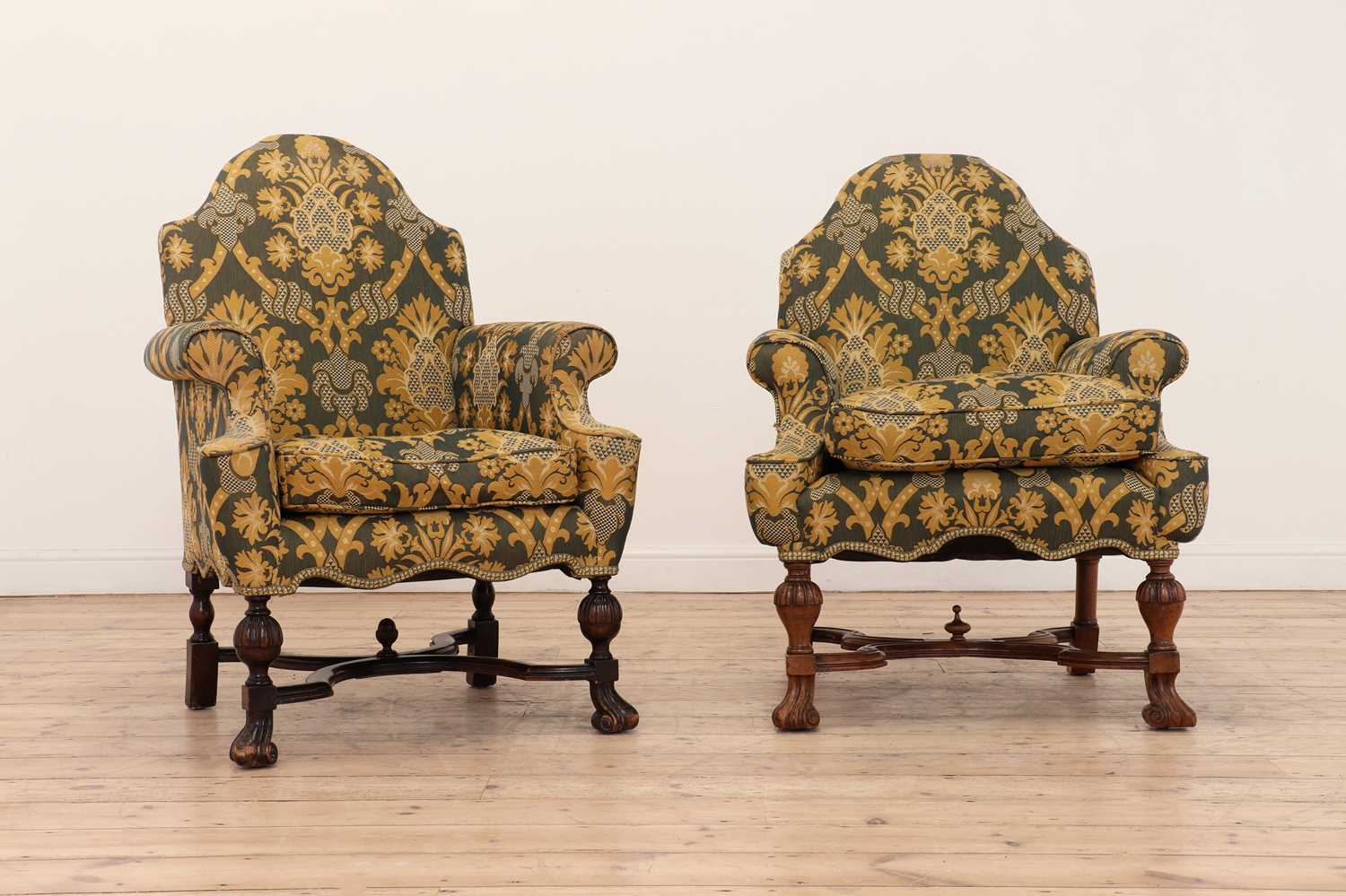 A matched pair of Queen Anne-style walnut armchairs,