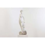 A weathered marble figure,