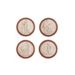 A set of four composition roundels,