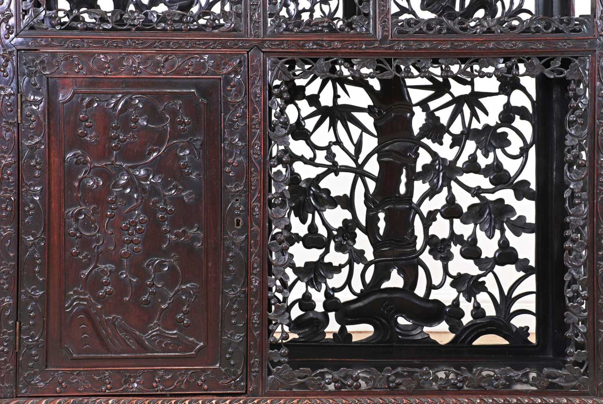 A carved and pierced hardwood cabinet, - Image 14 of 33