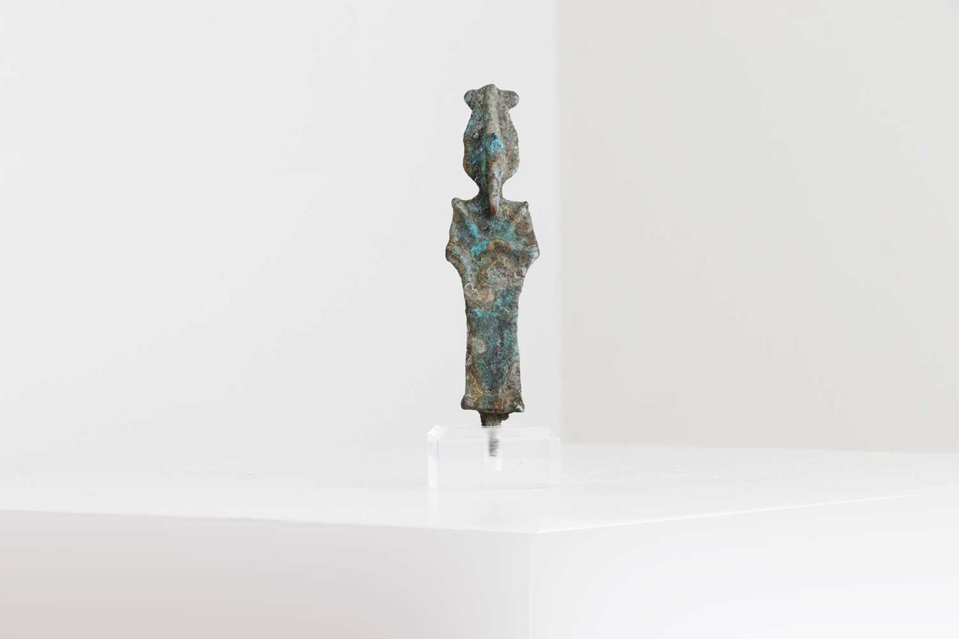 An Egyptian bronze shabti figure,