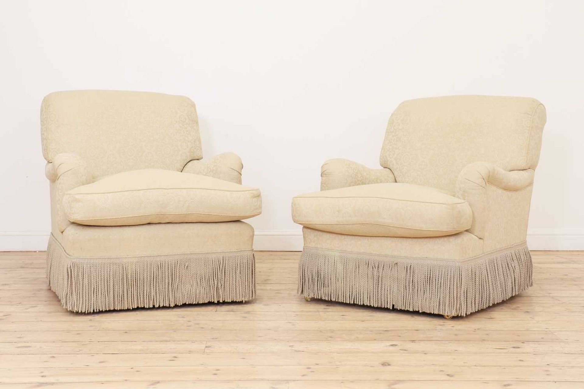 A pair of 'Bridgewater' armchairs by Howard Chairs Ltd.,