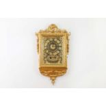 A gilt and gesso weight-driven wall clock,