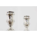 A pair of George II silver table candlesticks,