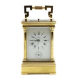 A brass carriage clock,