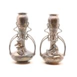 A pair of Art Nouveau pewter vases
