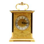 An Imhof gilt metal mantel clock,