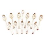 A set of six silver dessert spoons