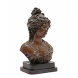 A bronze bust of a lady,