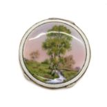 An enamelled silver compact,