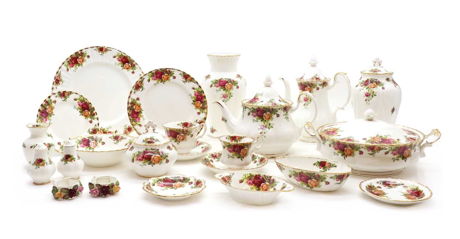 A comprehensive Royal Albert Country Rose dinner, tea and coffee service,