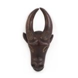 A Bamileke hardwood mask,