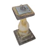 A baluster-shaped stoneware sundial having heavy bronze dial plate (60cm high)