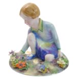 A circa 1930s Crown Staffordshire porcelain model of a young girl picking flowers