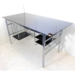 A modern designer black glass topped desk with shelves and chrome stand (ex John Lewis) (150 cm