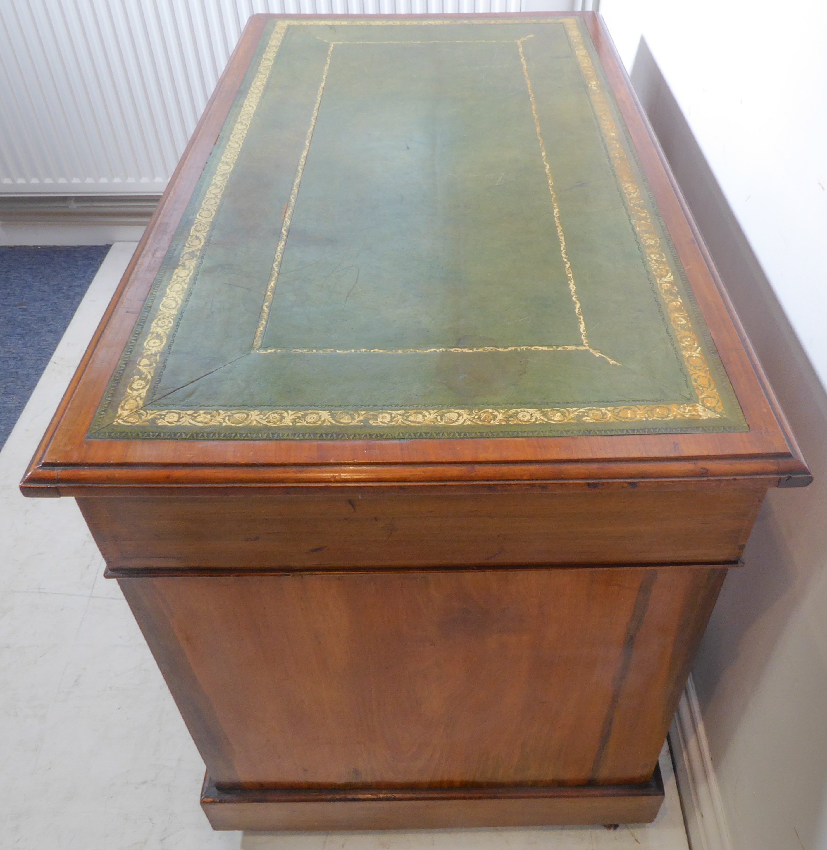 An early 20th century mahogany pedestal desk; the moulded gilt tooled green leather inset top - Image 4 of 4
