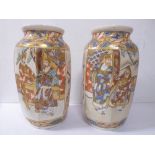 A pair of Satsuma decorated vases (25cm high)