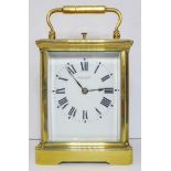 A 19th century brass and glass-sided carriage clock by Wilson and Sharp - Edinburgh, striking on the
