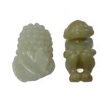 A Chinese pale celadon jade carving of grapes and vine leaves, together with a similar sized