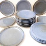 A selection of 22 blue-glaze studioware-style plates - 15 dinner plates (26cm), 5 plates (23cm) (5),