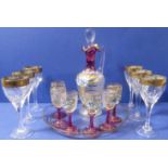 A set of six slice-cut and gilded crystal sherry glasses (12.5cm high) and a French liqueur set