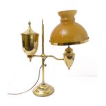 An ornate brass adjustable table lamp, together with a mustard coloured glass shade