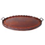 A 19th century oval mahogany and satinwood crossbanded two-handled serving tray (67cm wide)