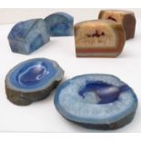 Intersectional, polished blue and brown hardstones to include two pairs of bookends with natural