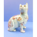 An early 20th century Galle-style pottery cat; with applied glass eyes and floral decoration on a
