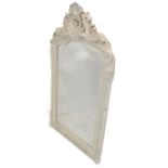 A large cream-framed wall-hanging looking glass –  central scallop-shell-style pierced pediment with