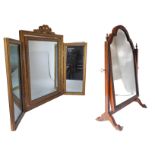 An early 20th century walnut-framed toilet mirror in Queen Anne style and a 1930s / 1940s gilt-