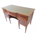 An Edwardian mahogany, boxwood strung and satinwood crossbanded desk; the leather inset top above