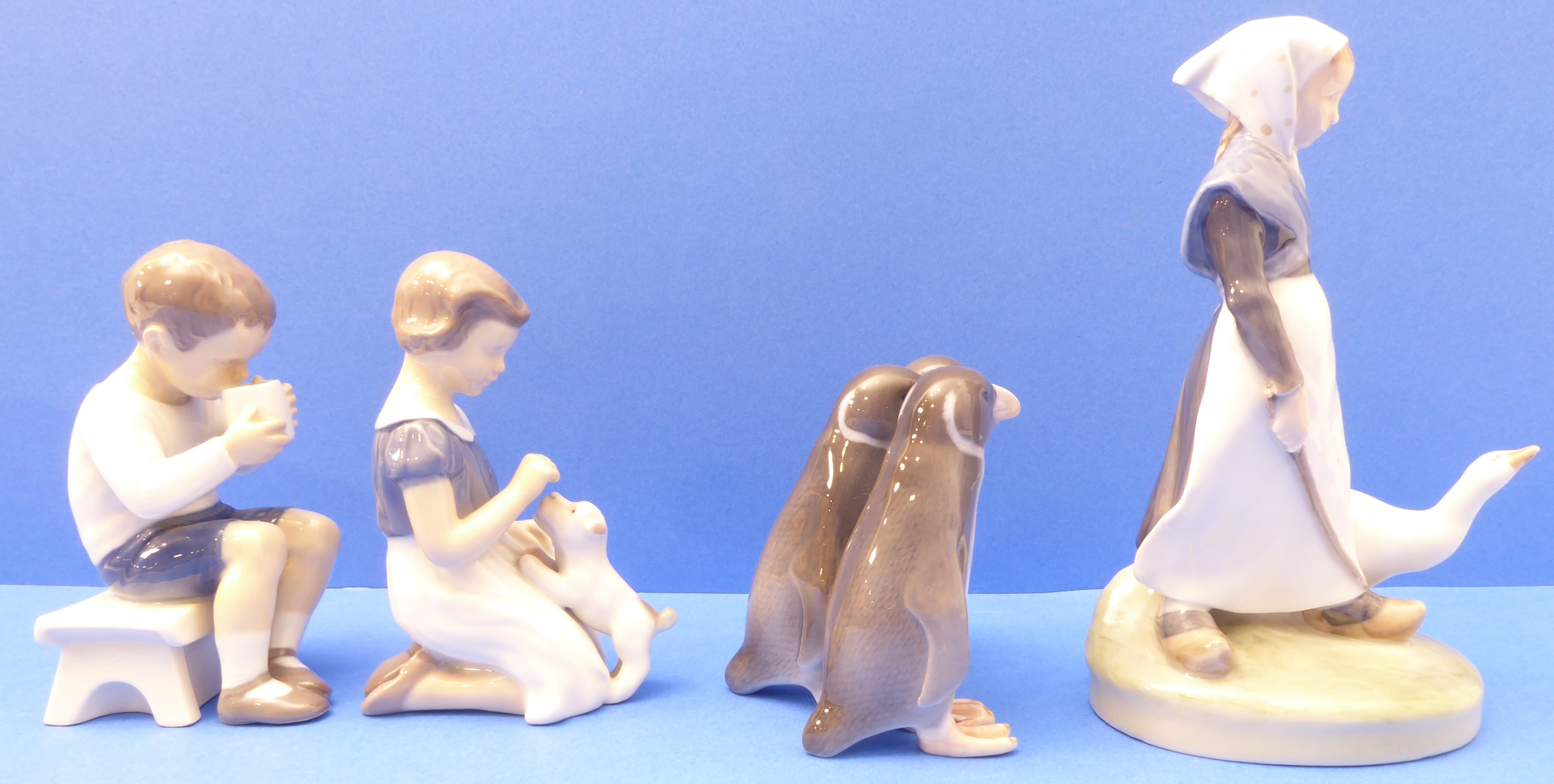 Four mid-20th century Royal Copenhagen porcelain figures (Danish factory): a young girl with - Image 5 of 7