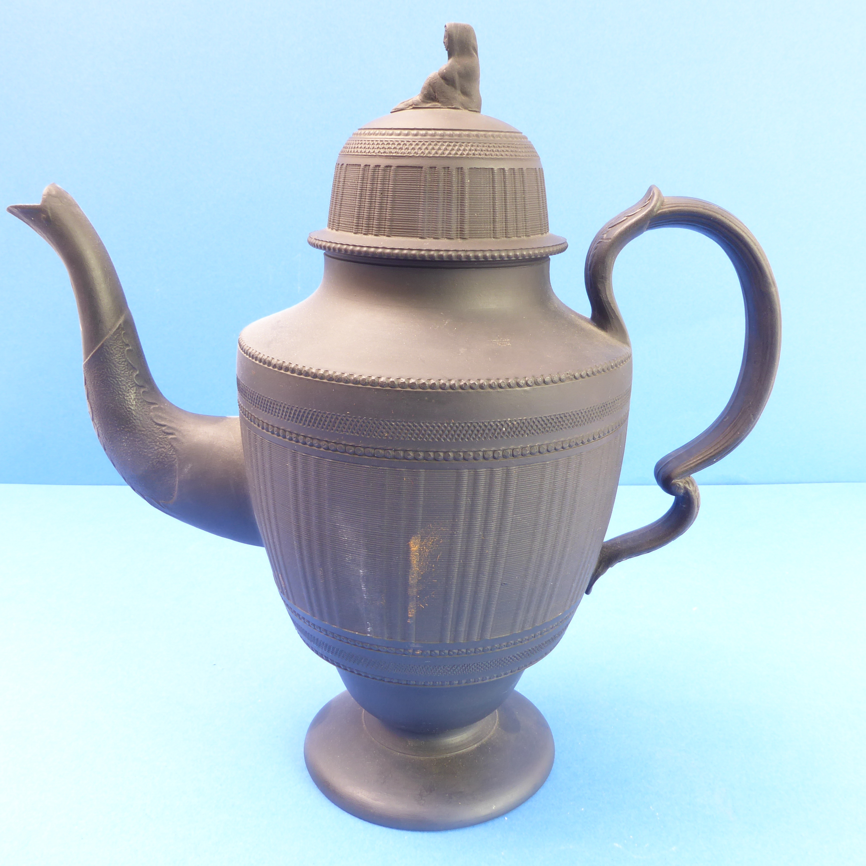 A 19th century black basalt teapot and cover with figurine finial (31cm high)Cover is fine; no - Image 2 of 3