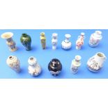 A selection of twelve miniature Chinese porcelain vases in the Chinese style to include rouleau