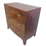 An early 19th century mahogany chest –  reeded edge top above three full-width graduated drawers,